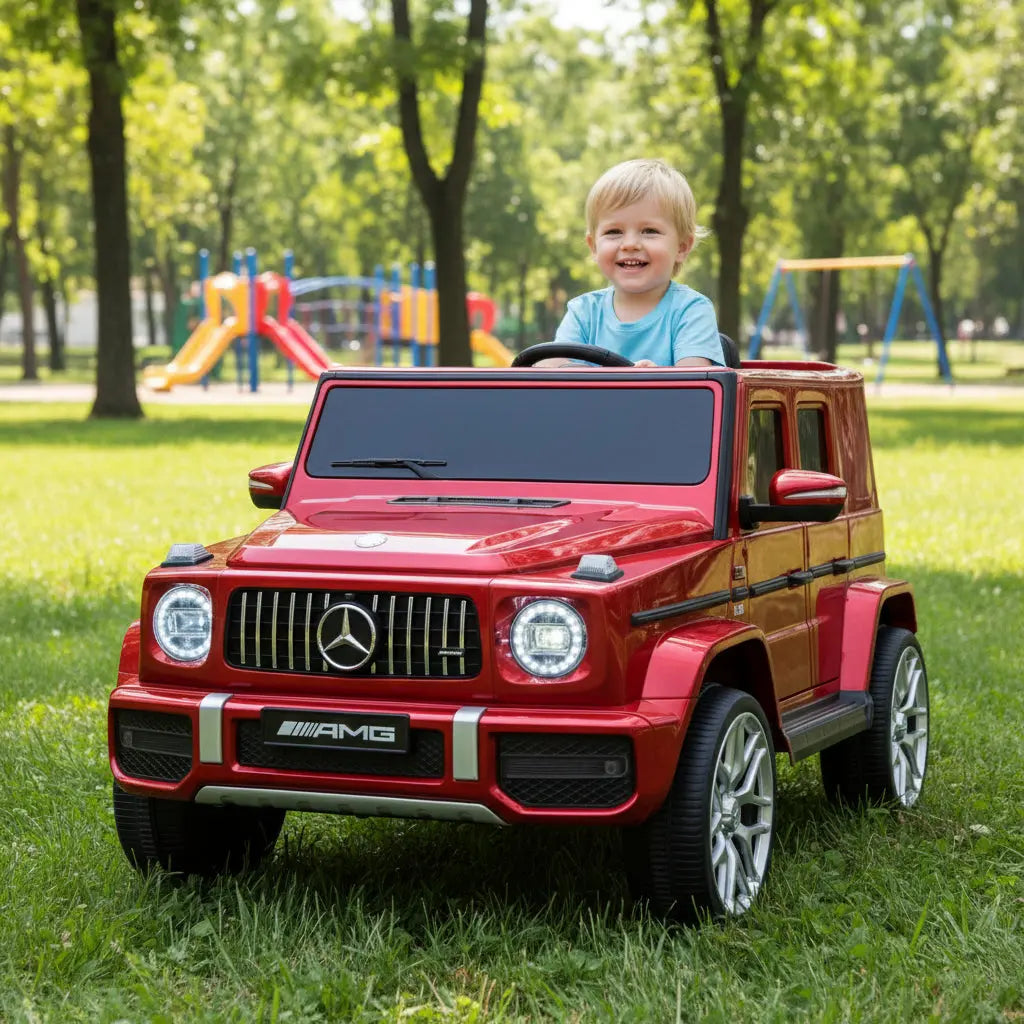 Red toy car with Mercedes-Benz logo on a white background