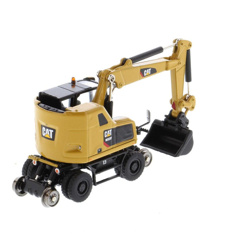 1:87 Cat® M323F Railroad Excavator Wheeled, Cat® Yellow avec 3 outils de travail High Line Series, 85656