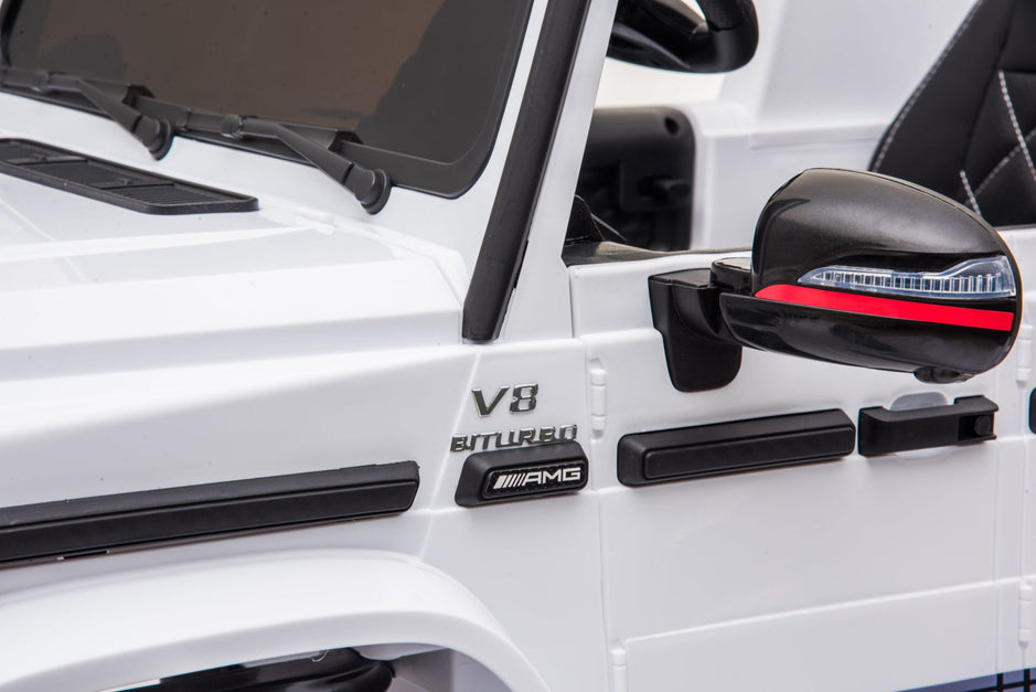 Mercedes-Benz AMG G63, Ride On Car eléctrico para niños de 12 V con control remoto para padres, luces LED, asiento de cuero y MP3- Kids On Wheelz