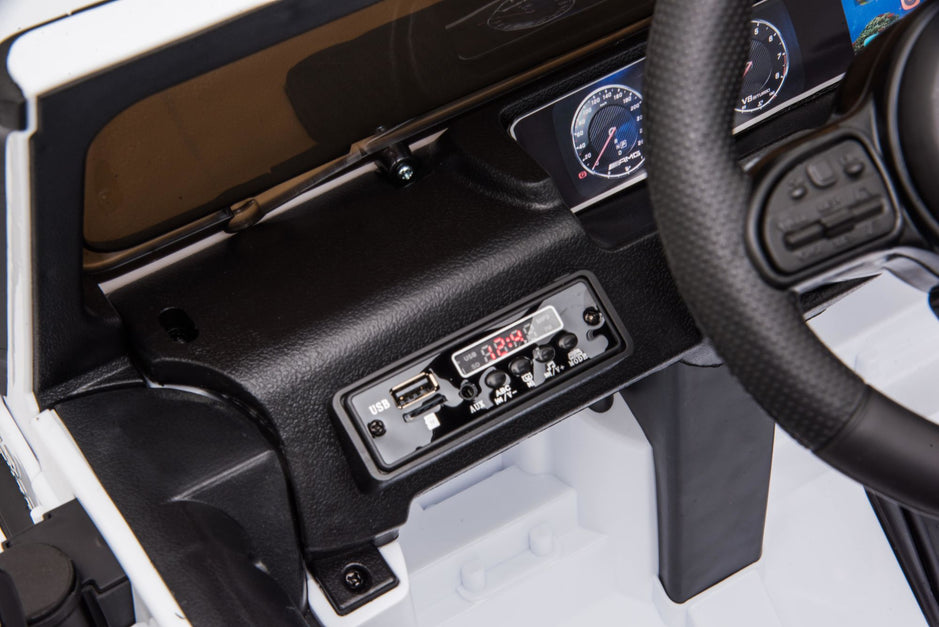 Mercedes-Benz AMG G63, Ride On Car eléctrico para niños de 12 V con control remoto para padres, luces LED, asiento de cuero y MP3- Kids On Wheelz